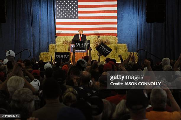 Republican Presidential nominee Donald Trump addresses supporters during a campaign rally at the Jefferson County Fairgrounds - Rodeo Arena & Event...