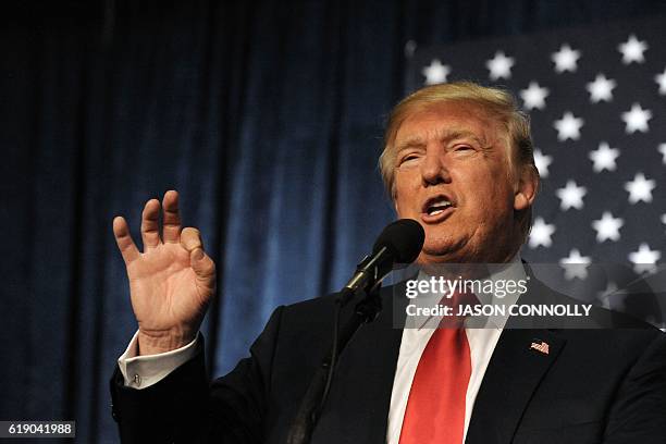 Republican Presidential nominee Donald Trump addresses supporters during a campaign rally at the Jefferson County Fairgrounds - Rodeo Arena & Event...