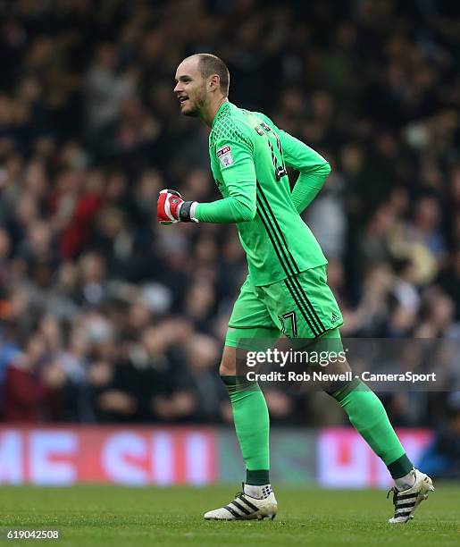 Fulham's David Button celebrates after his side had scored their third goal during the Sky Bet Championship match between Fulham and Huddersfield...