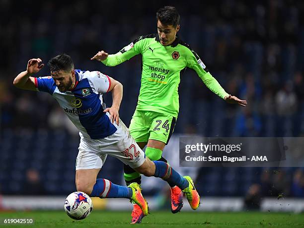 Craig Conway of Blackburn Rovers and Joao Teixeira of Wolverhampton Wanderers during the Sky Bet Championship match between Blackburn Rovers and...