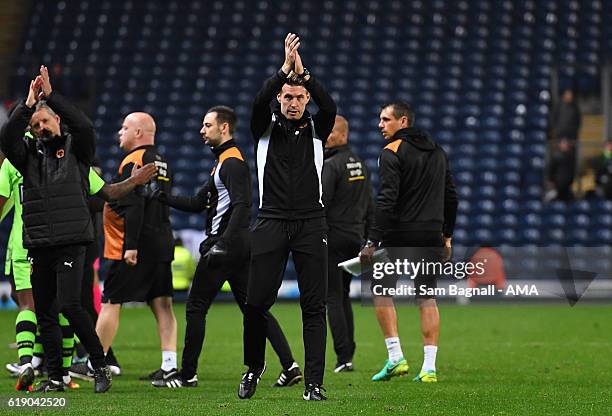 Rob Edwards Interim head coach of Wolverhampton Wanderers thanks the travelling fans at full time during the Sky Bet Championship match between...