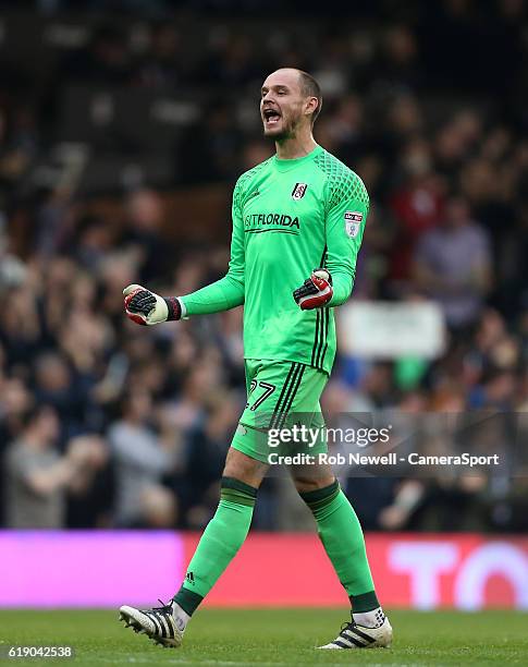 Fulham's David Button celebrates after his side had scored their third goal during the Sky Bet Championship match between Fulham and Huddersfield...