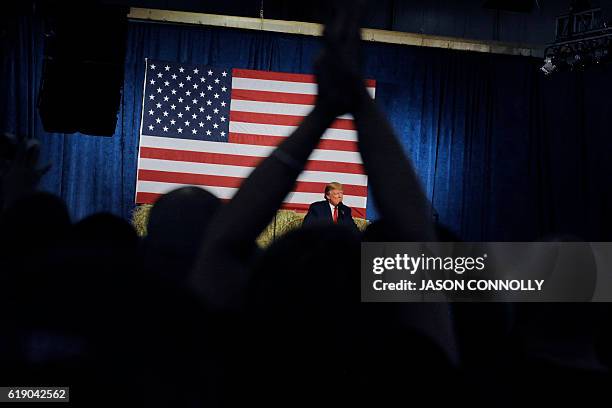 Republican Presidential nominee Donald Trump addresses supporters during a campaign rally at the Jefferson County Fairgrounds - Rodeo Arena & Event...