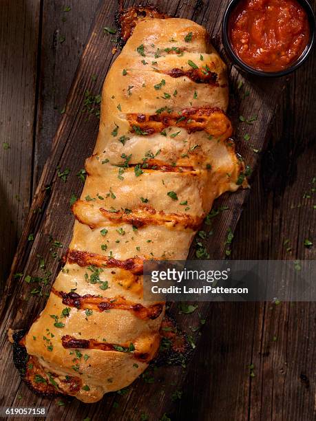 stromboli - calzone stock pictures, royalty-free photos & images