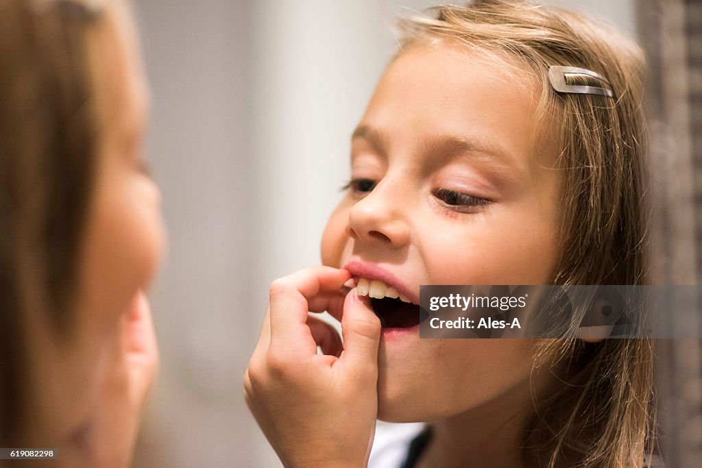 Tirando un dente fuori