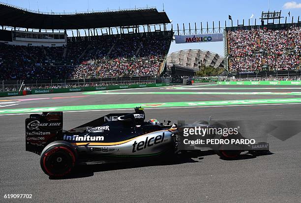 Sahara Force India F1 Team Mexican driver Sergio "Checo" Perez powers his car during the Formula One Mexico Grand Prix qualifying session at the...
