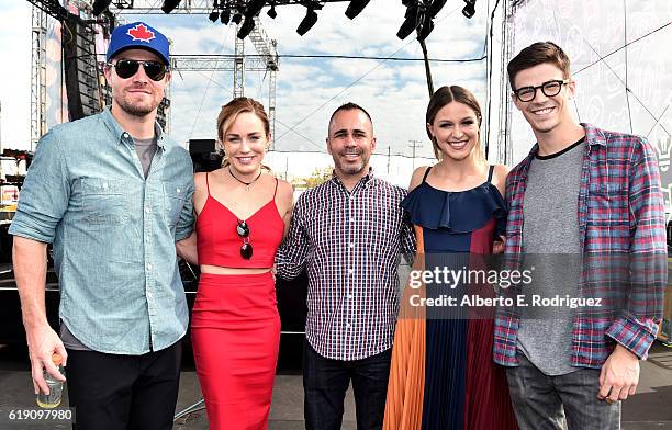 Actors Stephen Amell, Caity Lotz, EW editor-in-chief Henry Goldblatt, actors Melissa Benoist and Grant Gustin pose at Entertainment Weekly's PopFest...