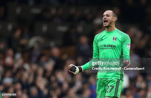 Fulham's David Button celebrates after his side had scored their third goal during the Sky Bet Championship match between Fulham and Huddersfield...