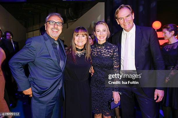 German actor Wolfgang Stumph with his wife Christine Stumph and Leipzig major Burkhard Jung and his wife Ayleena Jung during the aftershow party at...