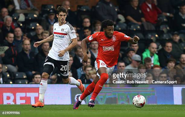 Huddersfield Town's Kasey Palmer and Fulham's Lucas Piazon during the Sky Bet Championship match between Fulham and Huddersfield Town at Craven...