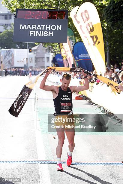 Oska Inkster-Baynes crossed the finish line to win the ASB Auckland Marathon during the ASB Auckland Marathon Run Down The Rate promotion on October...