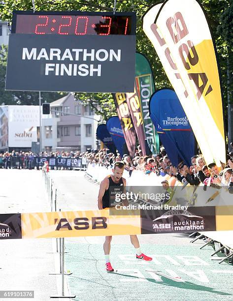 Oska Inkster-Baynes crossed the finish line to win the ASB Auckland Marathon during the ASB Auckland Marathon Run Down The Rate promotion on October...
