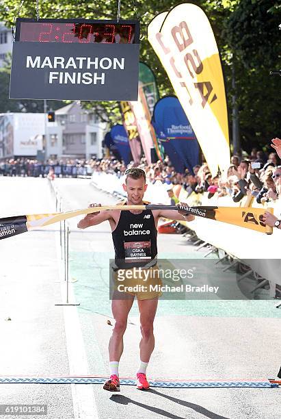 Oska Inkster-Baynes crossed the finish line to win the ASB Auckland Marathon during the ASB Auckland Marathon Run Down The Rate promotion on October...