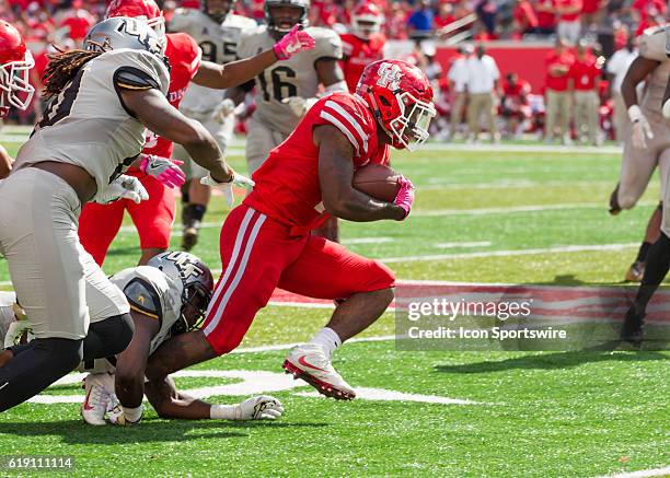 Houston Cougars quarterback Greg Ward Jr. Carries the ball during the NCAA football game between the Central Florida Knights and Houston Cougars on...