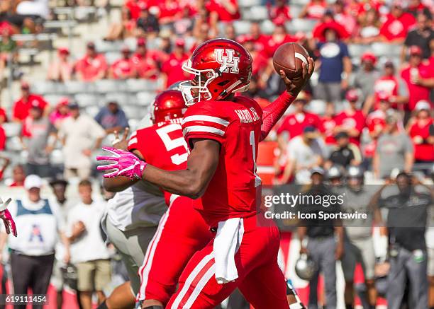 Houston Cougars quarterback Greg Ward Jr. Throws for a pass during the NCAA football game between the Central Florida Knights and Houston Cougars on...