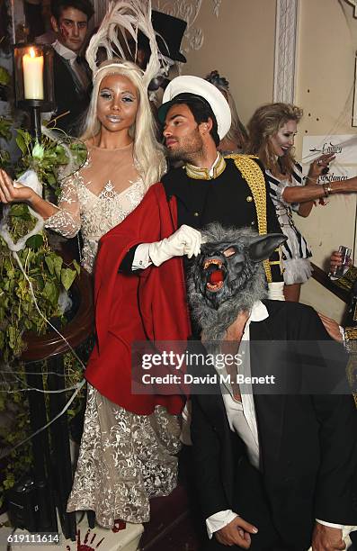 Emma McQuiston, Viscountess of Weymouth, Mark-Francis Vandelli and guest attend Halloween at Annabel's at 46 Berkeley Square on October 29, 2016 in...