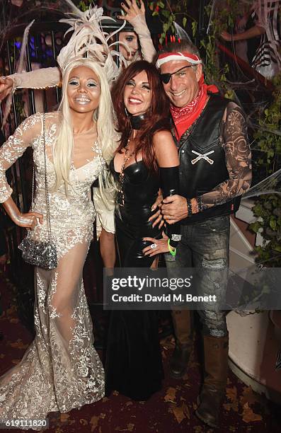 Emma McQuiston, Viscountess of Weymouth, Lisa Tchenguiz and Steve Varsano attend Halloween at Annabel's at 46 Berkeley Square on October 29, 2016 in...