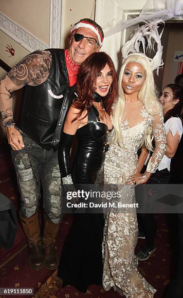 Steve Varsano, Lisa Tchenguiz and Emma McQuiston, Viscountess of Weymouth, attend Halloween at Annabel's at 46 Berkeley Square on October 29, 2016 in...