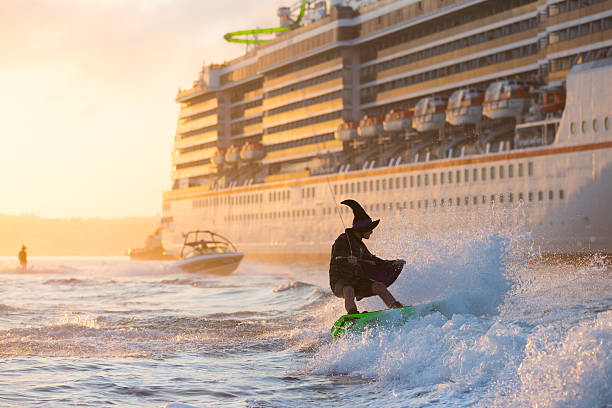 AUS: Waterskiing Witches Celebrate Halloween On Sydney Harbour