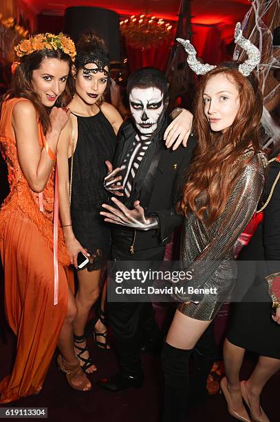 Rosanna Falconer, Sarah Ann Macklin, guest and Olivia Grant attend Halloween at Annabel's at 46 Berkeley Square on October 29, 2016 in London,...