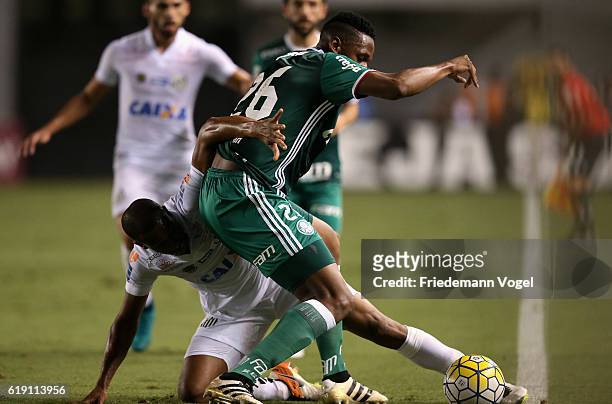 Yerry Mina of Palmeiras fights for the ball with Copete of Santos during the match between Santos and Palmeiras for the Brazilian Series A 2016 at...