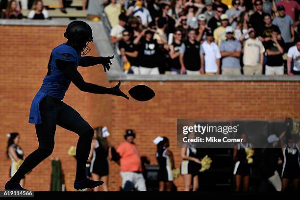 Punter J.D. Mote of the Army Black Knights makes punts against the Wake Forest Demon Deacons at BB&T Field on October 29, 2016 in Winston Salem,...