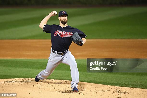 Corey Kluber of the Cleveland Indians pitches in the first inning against the Chicago Cubs in Game Four of the 2016 World Series at Wrigley Field on...