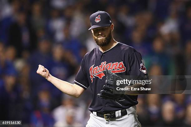 Corey Kluber of the Cleveland Indians reacts after the second inning against the Chicago Cubs in Game Four of the 2016 World Series at Wrigley Field...