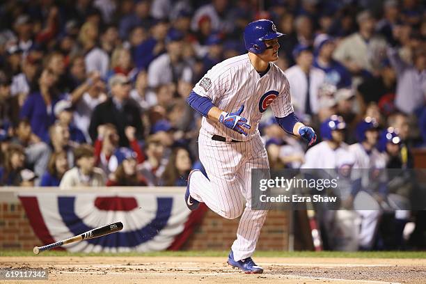 Anthony Rizzo of the Chicago Cubs hits a single in the first inning against the Cleveland Indians in Game Four of the 2016 World Series at Wrigley...