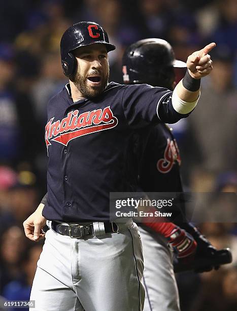 Jason Kipnis of the Cleveland Indians celebrates after scoring a run in the third inning against the Chicago Cubs in Game Four of the 2016 World...
