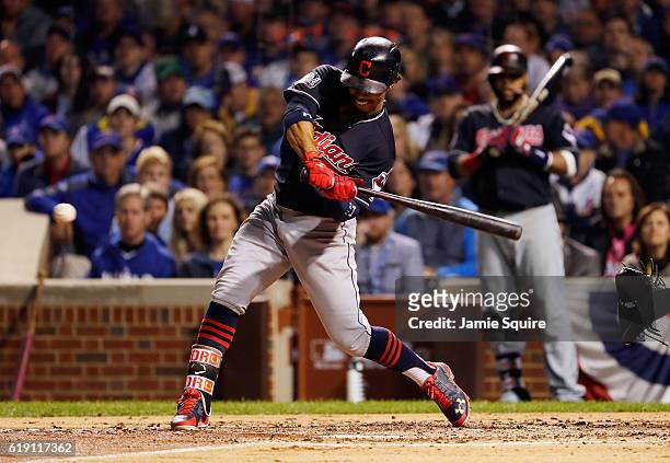 Francisco Lindor of the Cleveland Indians hits a single in the third inning against the Chicago Cubs in Game Four of the 2016 World Series at Wrigley...