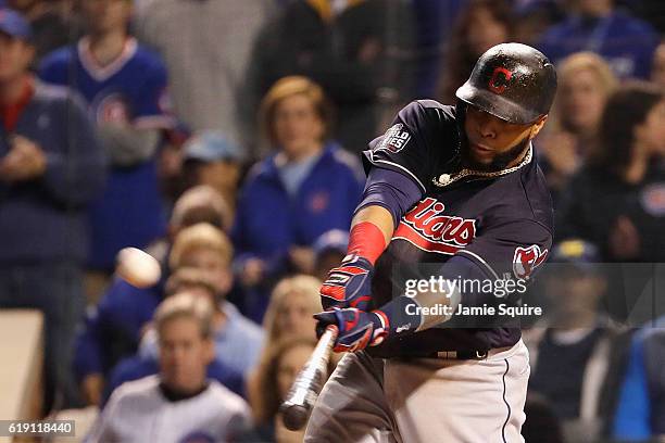 Carlos Santana of the Cleveland Indians hits a home run in the second inning against the Chicago Cubs in Game Four of the 2016 World Series at...