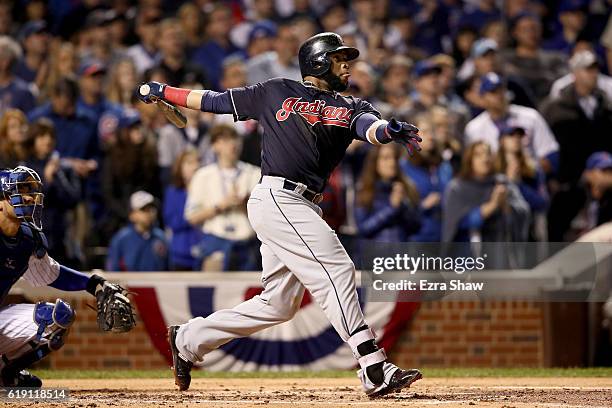 Carlos Santana of the Cleveland Indians hits a home run in the second inning against the Chicago Cubs in Game Four of the 2016 World Series at...