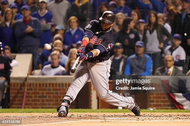 Carlos Santana of the Cleveland Indians hits a home run in the second inning against the Chicago Cubs in Game Four of the 2016 World Series at...