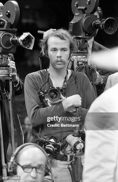 Photographer David Kennerly at Frazier-Ali fight.