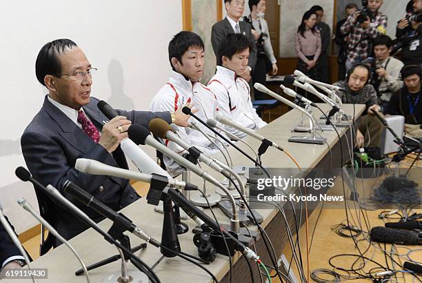 Japan - Japan Wrestling Federation President Tomiaki Fukuda speaks at a press conference in Tokyo on Feb. 13 after the International Olympic...