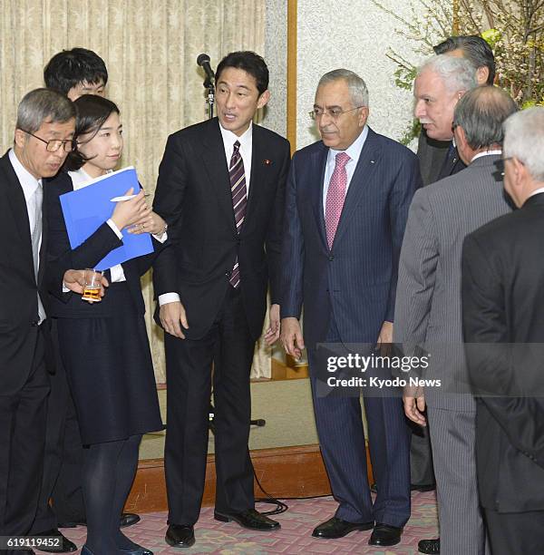 Japan - Japanese Foreign Minister Fumio Kishida and Palestinian Prime Minister Salam Fayyad stand together on Feb. 13 in Tokyo, where Japan and...