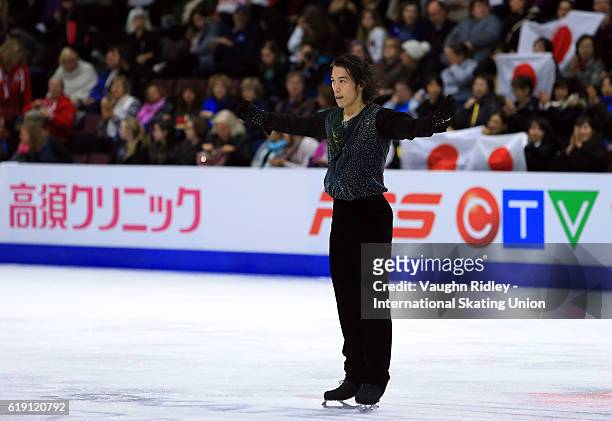 Takahito Mura of Japan competes in the Men Free Program during the ISU Grand Prix of Figure Skating Skate Canada International at Hershey Centre on...