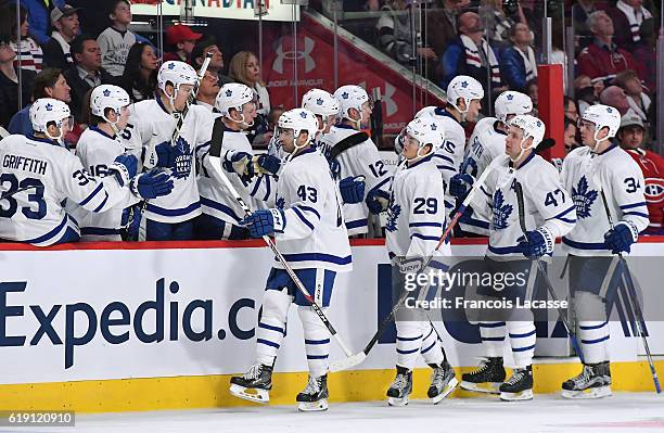 Nazem Kadri of the Toronto Maple Leafs celebrates with the bench after scoring a goal against the Montreal Canadiens in the NHL game at the Bell...
