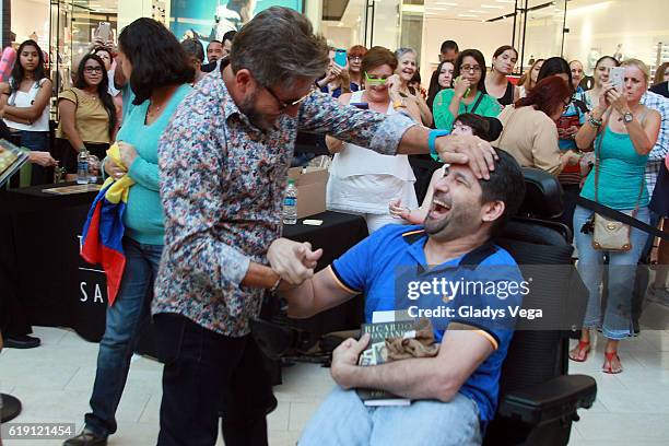 Ricardo Montaner shares to his fans like Hector Mendez as part of the launch of his new album "Ida y Vuelta" at The Mall Of San Juan on October 29,...