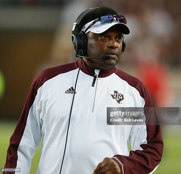 Head coach Kevin Sumlin of the Texas A&M Aggies looks on from the sidelines in the first half against the New Mexico State Aggies at Kyle Field on...