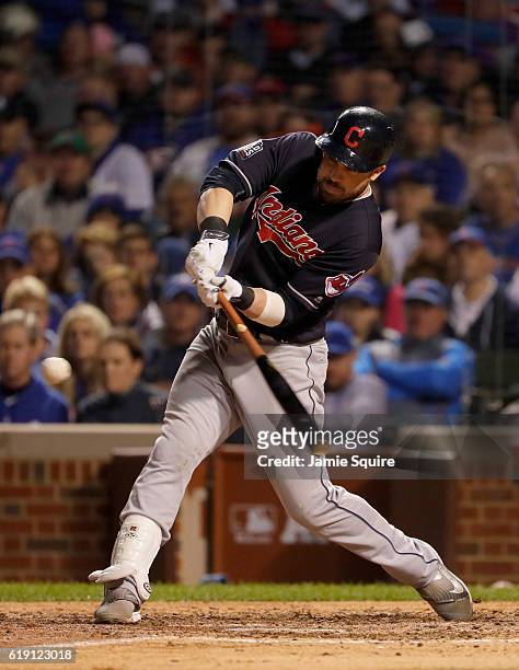 Jason Kipnis of the Cleveland Indians hits a home run in the seventh inning against the Chicago Cubs in Game Four of the 2016 World Series at Wrigley...