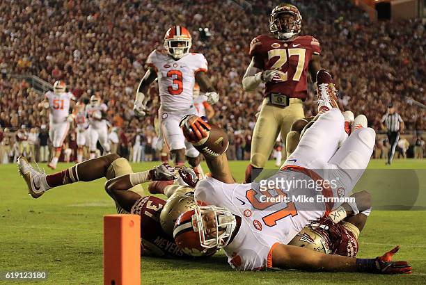 Jordan Leggett of the Clemson Tigers dives for the endzone during a game against the Florida State Seminoles at Doak Campbell Stadium on October 29,...