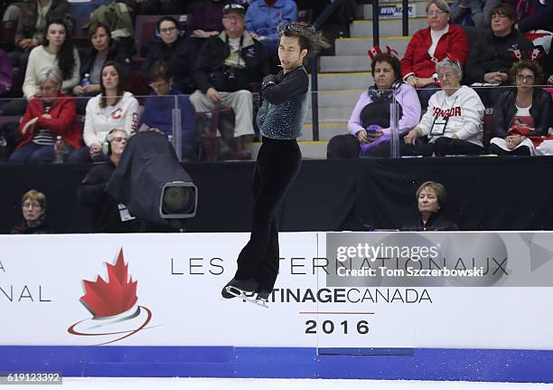 Takahito Mura of Japan competes in the Men's Singles Free Program during day two of the 2016 Skate Canada International at Hershey Centre on October...