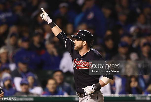 Jason Kipnis of the Cleveland Indians celebrates after hitting a home run in the seventh inning against the Chicago Cubs in Game Four of the 2016...