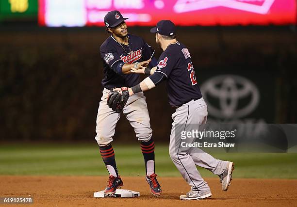 Francisco Lindor and Jason Kipnis of the Cleveland Indians celebrate after beating the Chicago Cubs 7-2 in Game Four of the 2016 World Series at...