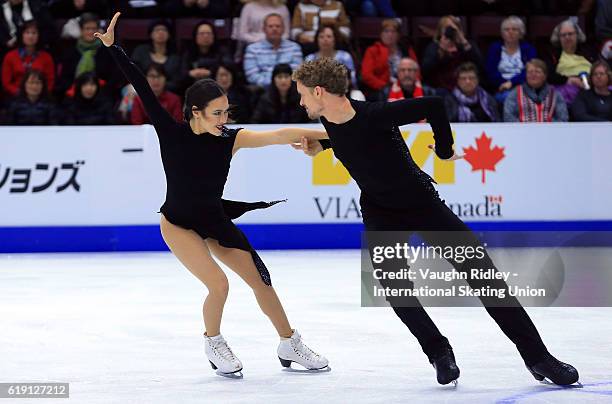 Madison Chock and Evan Bates of the USA compete in the Ice Dance Free Program during the ISU Grand Prix of Figure Skating Skate Canada International...