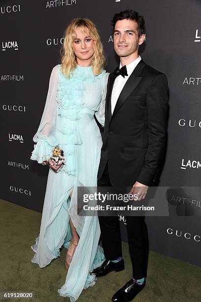 Actress Brie Larson , wearing Gucci, and recording artist Alex Greenwald attend the 2016 LACMA Art + Film Gala honoring Robert Irwin and Kathryn...