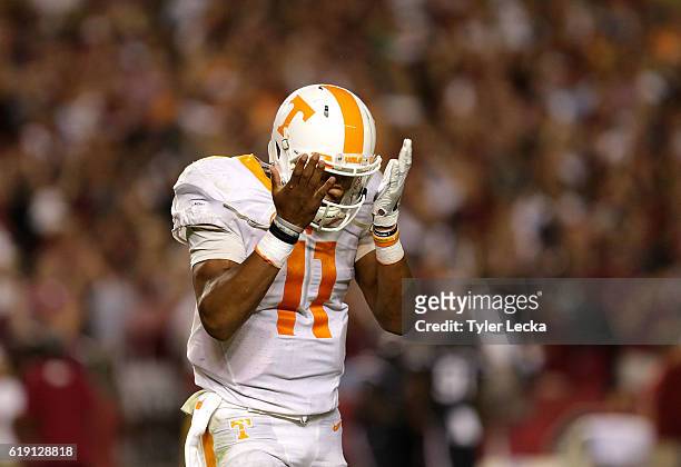 Joshua Dobbs of the Tennessee Volunteers reacts after throwing an interception in the fourth quarter against the South Carolina Gamecocks during...
