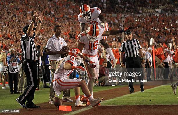 Jordan Leggett of the Clemson Tigers celebrates a touchdown during a game against the Florida State Seminoles at Doak Campbell Stadium on October 29,...